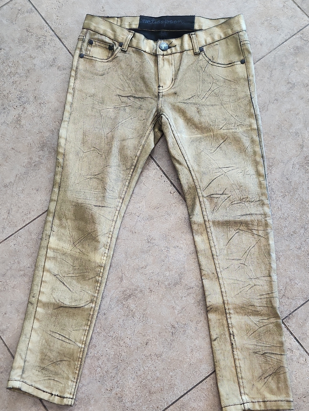 NWOT..Women’s Metallic Gold Skinny Jeans